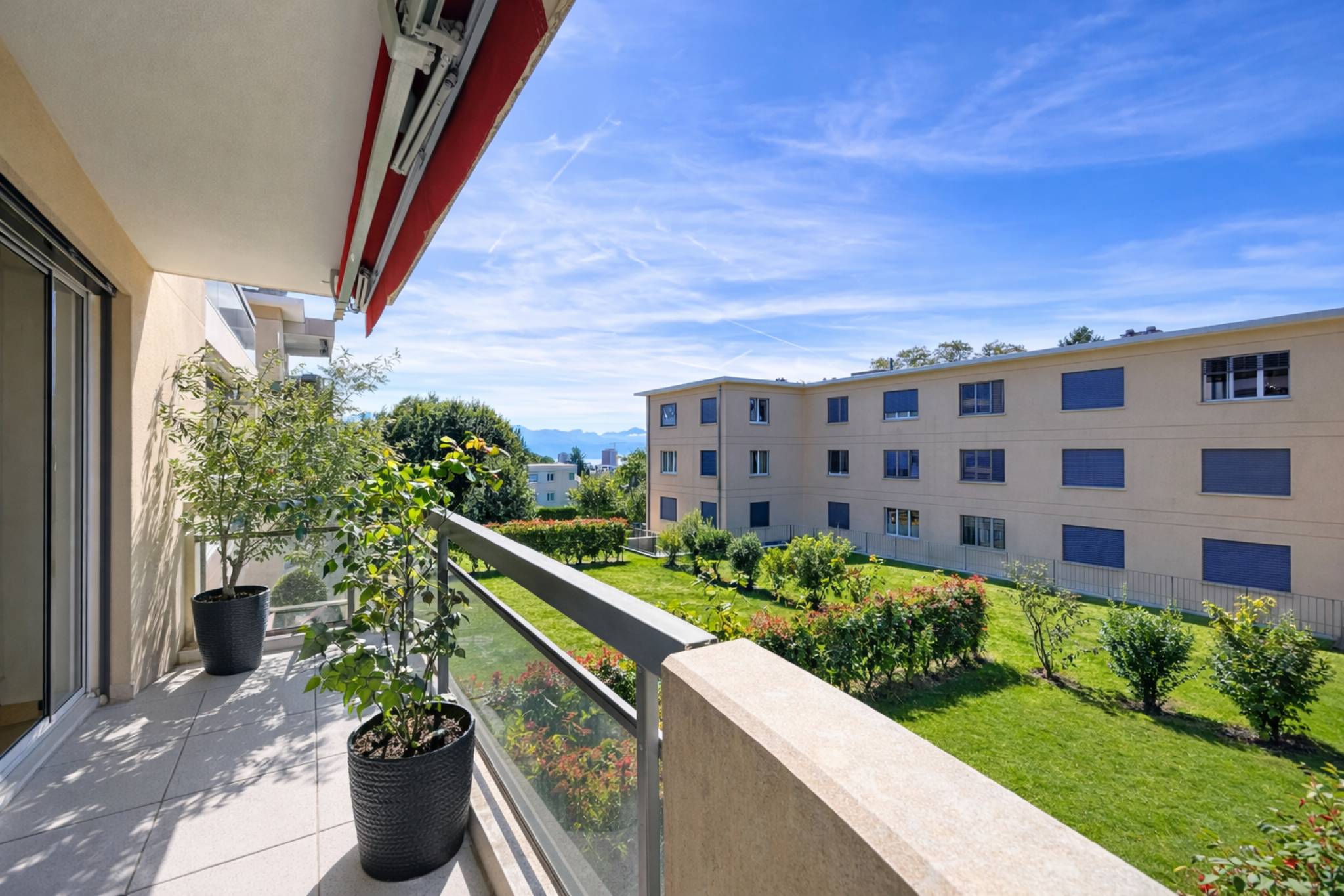 Appartement de standing de 4.5 pièces au cadre sécurisé et verdoyant