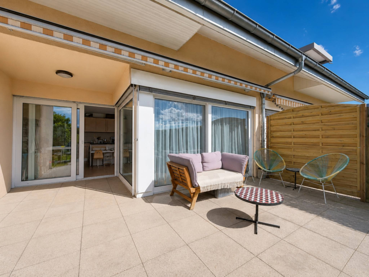 Appartement de 3,5 pièces en rez-de-jardin, vendu loué
