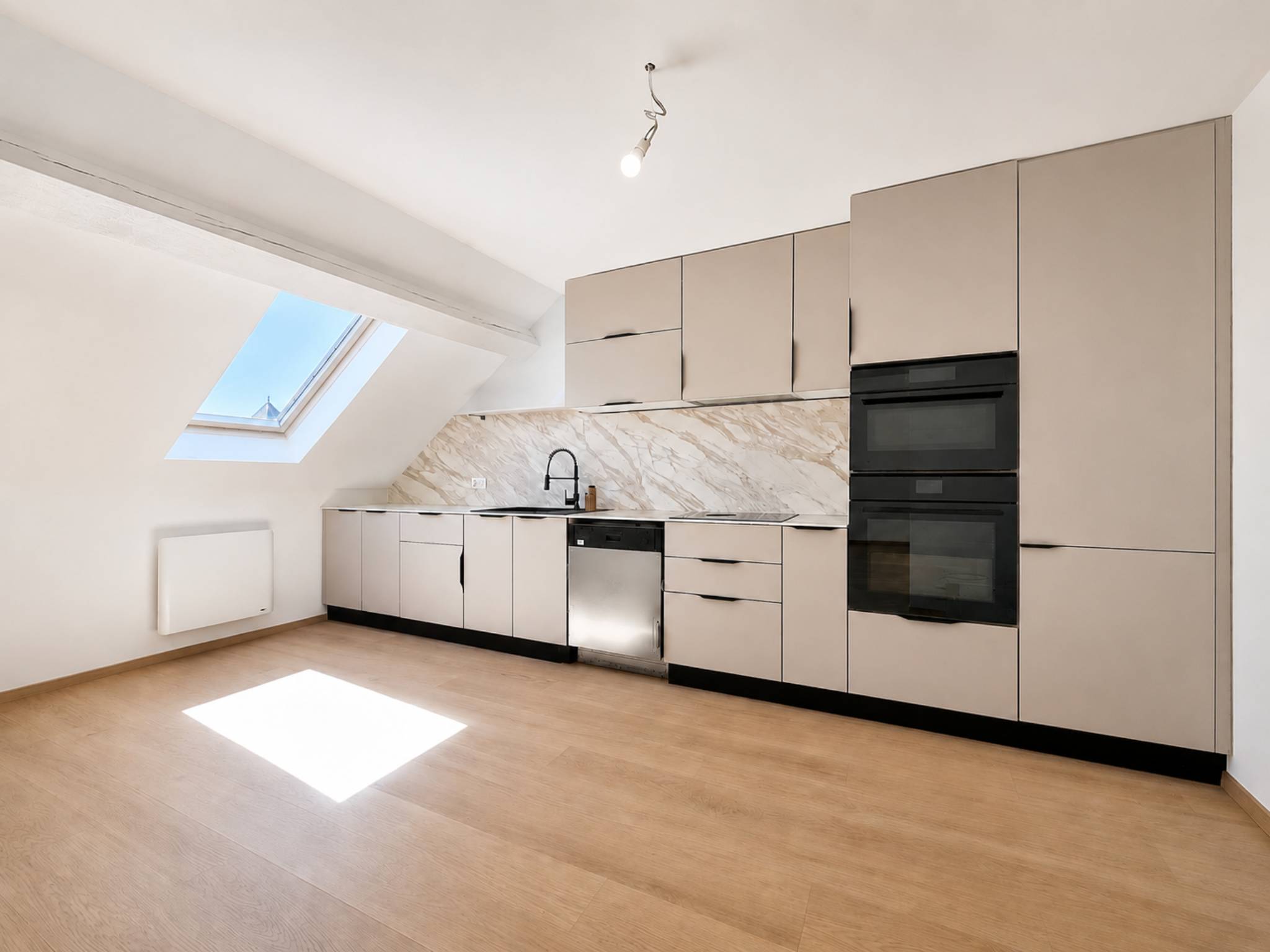 Au centre du village, attique de 153 m2 avec du cachet