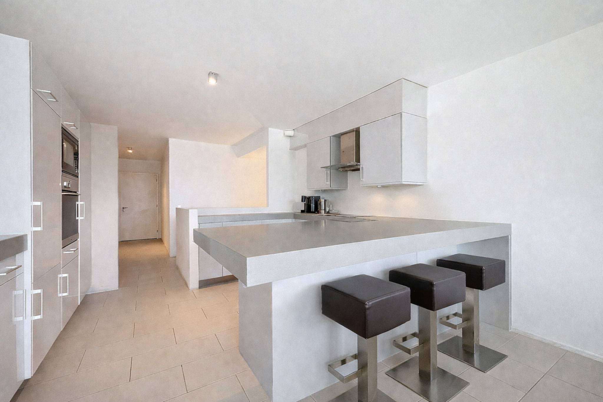 Duplex contemporain avec jardin privatif et vue sur les Alpes à Pully Sud