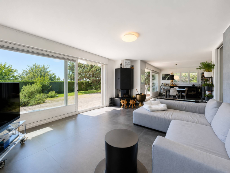 Appartement en rez-de-jardin de plus 145 m2