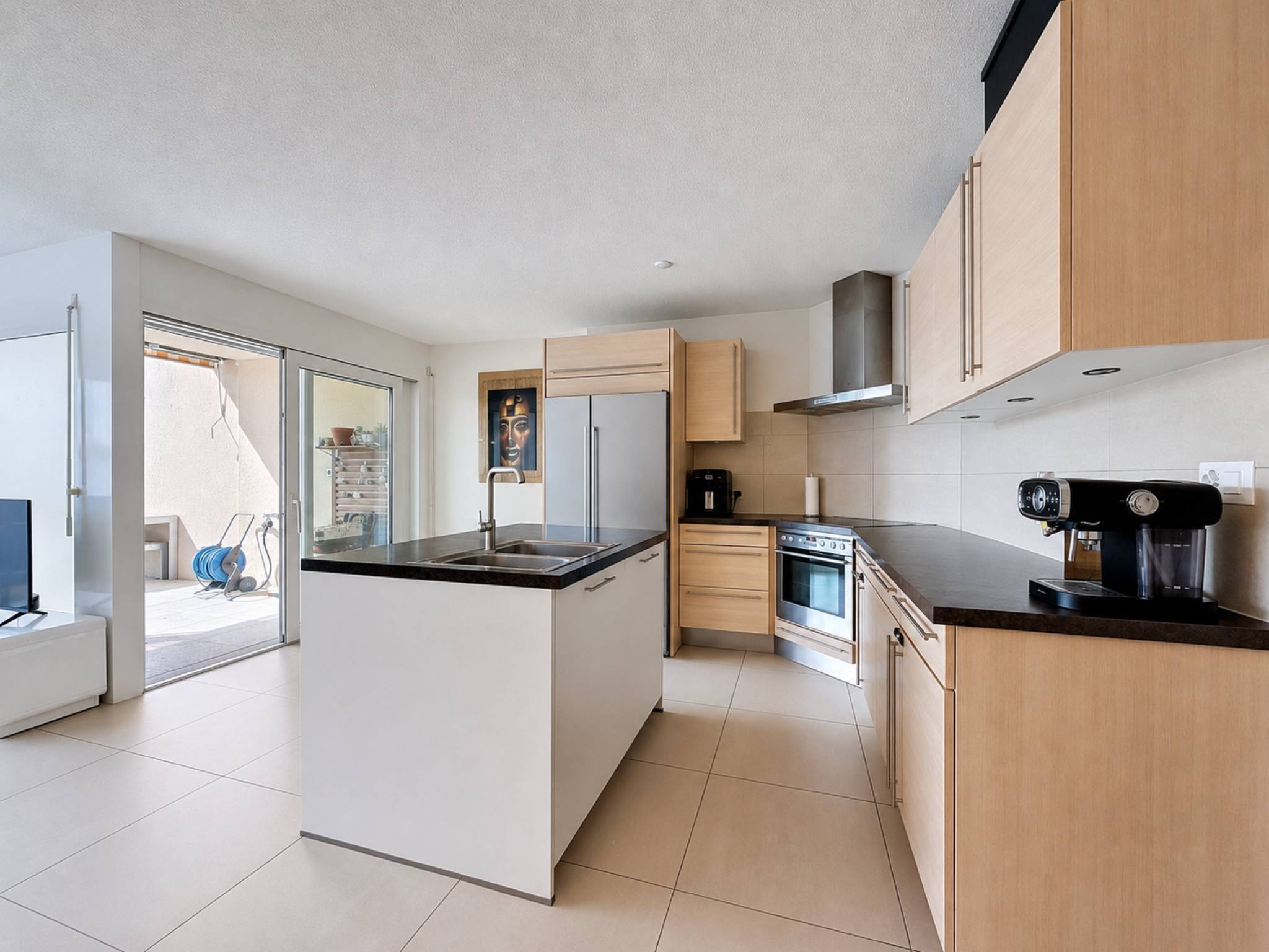 Appartement de 3,5 pièces en rez-de-jardin, vendu loué