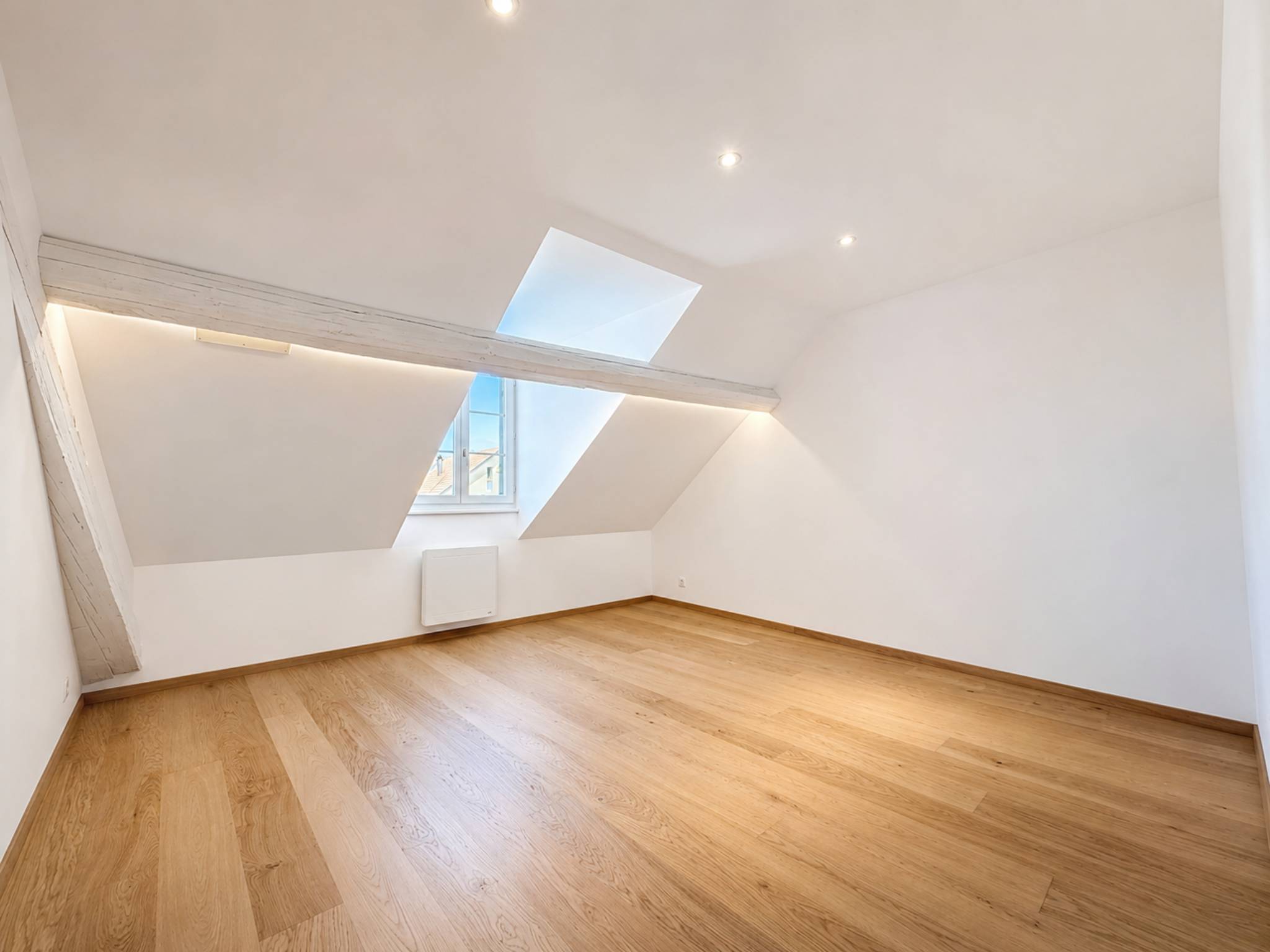 Au centre du village, attique de 153 m2 avec du cachet